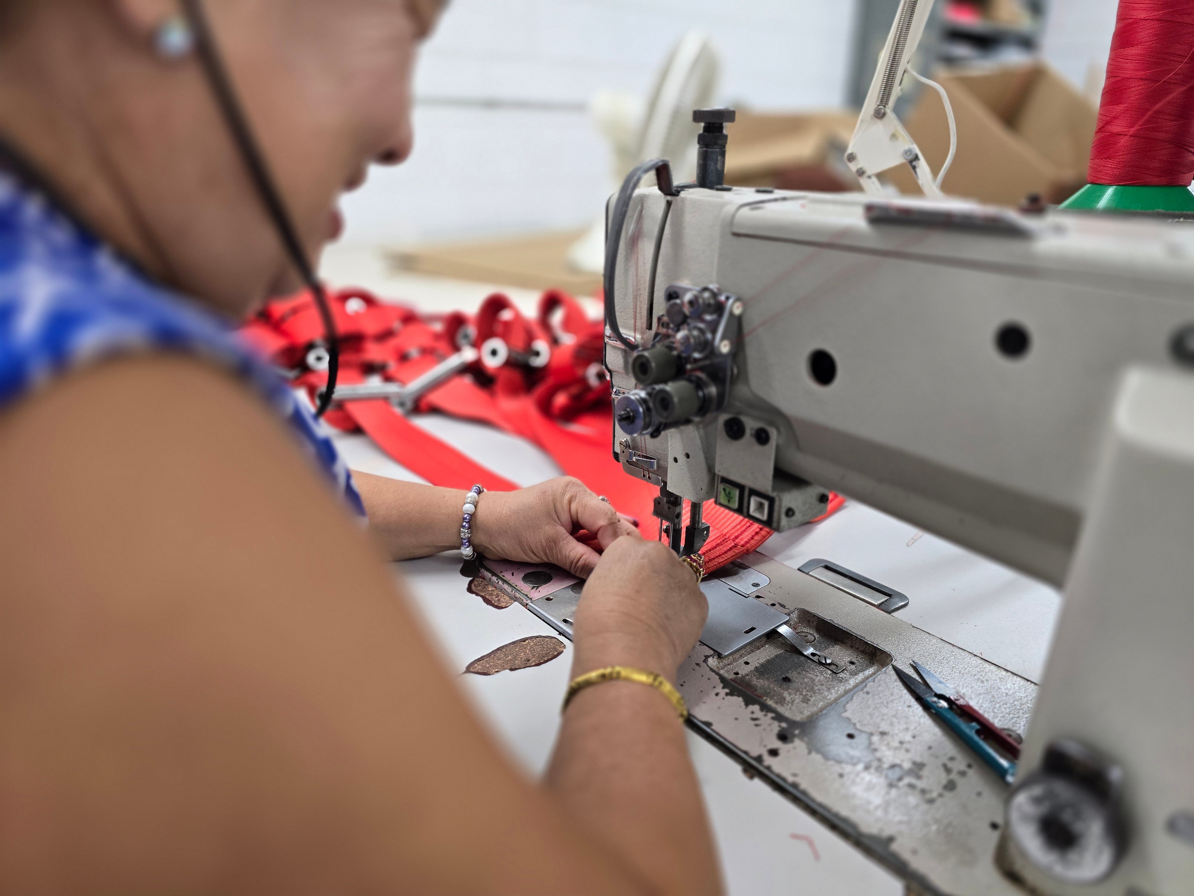 Midwest Textile sewing operator at an industrial machine in Green Bay, Wisconsin
